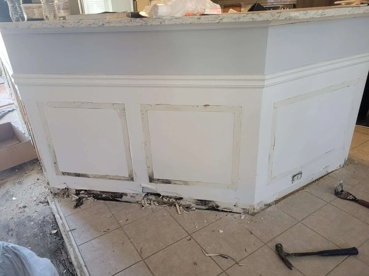 Water damage and mold on kitchen during Storm Damage Restoration in Wasco